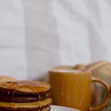 Honey with cake and cup of tea
