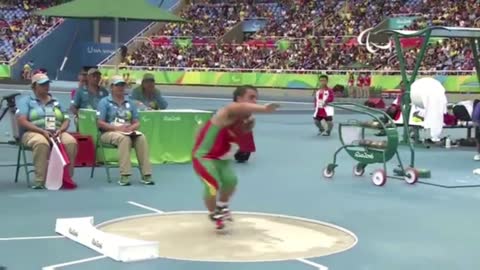 dog shot put in the air