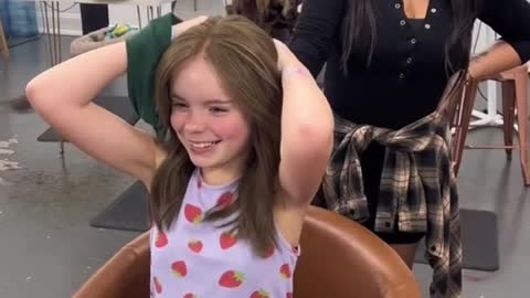 Little girl gets her first wig