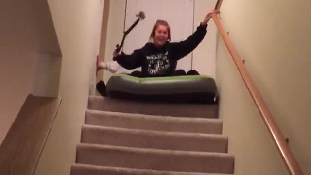 Two girls green air mattress stair slide