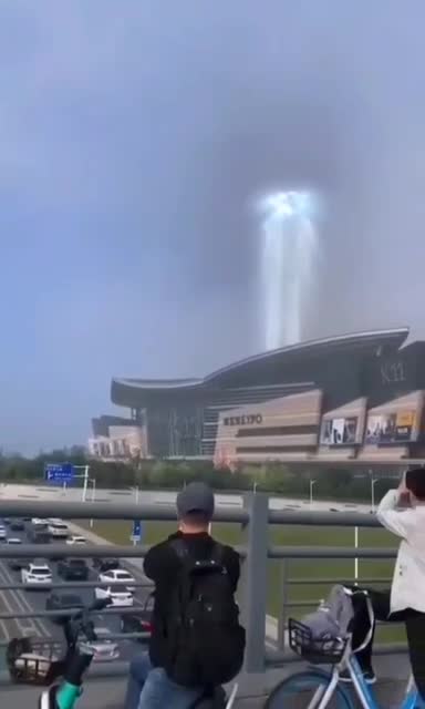 Crowds gathering what looks like a biblical light 👀