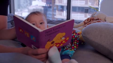 A small child reading a story