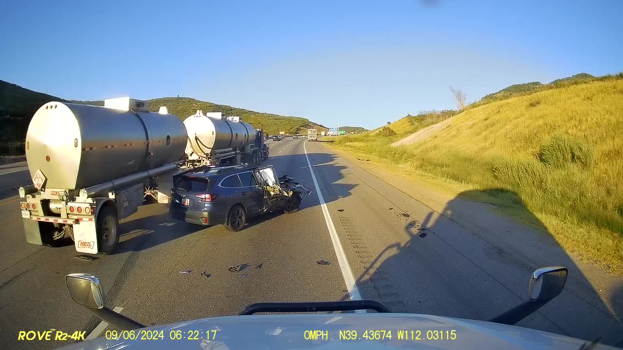 Subaru Crashes Into Back of Semi