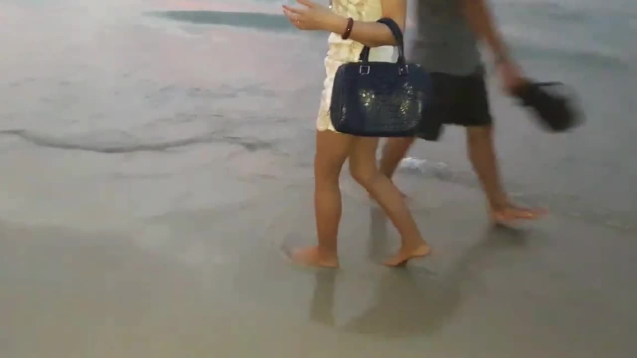 Strolling along Patong Beach...