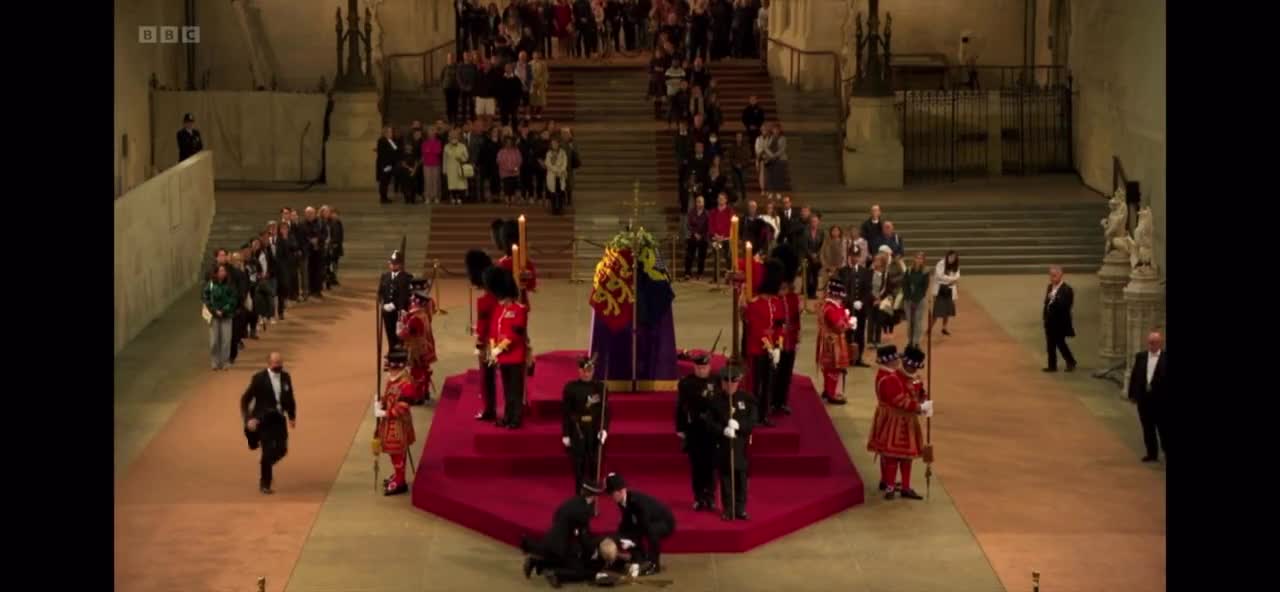 WOW! A guard hand-picked drops face first at the Queens Service?? Sudden Adult Death (SAD) by jab?