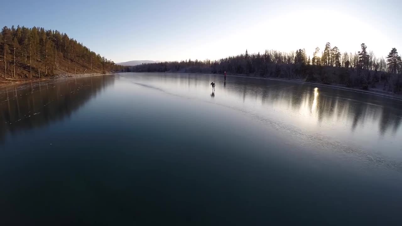 Owner And Her Dogs Skate On Thin See-Through Ice