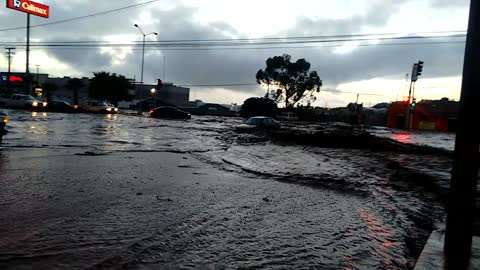 Car Swept Away by Flash Flood