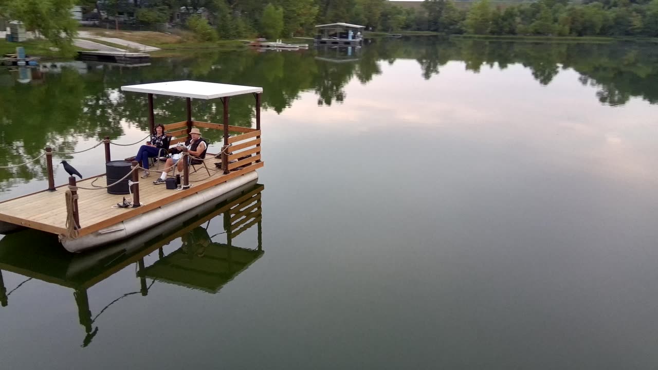 Morning coffee on calm lake