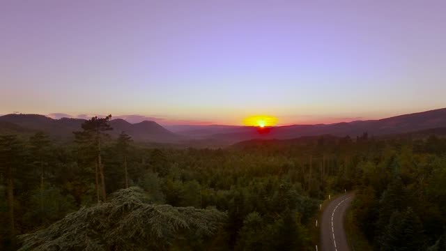 Aerial footage of a mountain road at dusk!