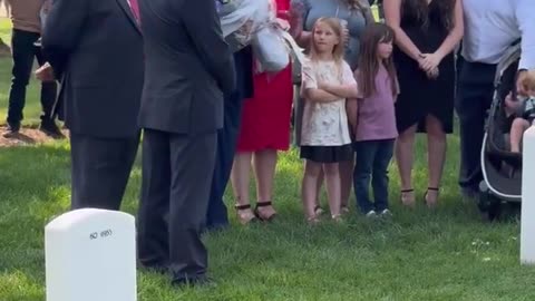 President Trump laying flowers at the grave of soldier who was killed in Afghanistan.