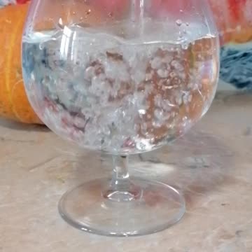 Time lapse shot of water in a glass