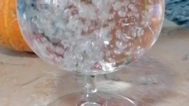 Time lapse shot of water in a glass
