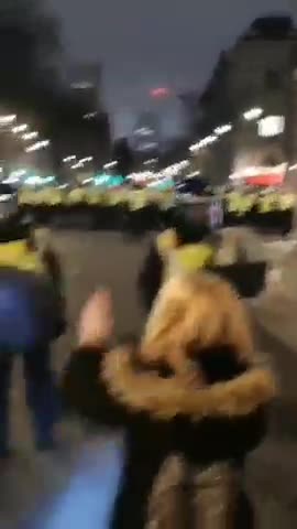 London: Vaccine passport protesters do the hokey pokey Dec. 18, 2021