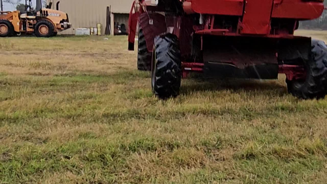 Moving the combine out of the rain while working on it