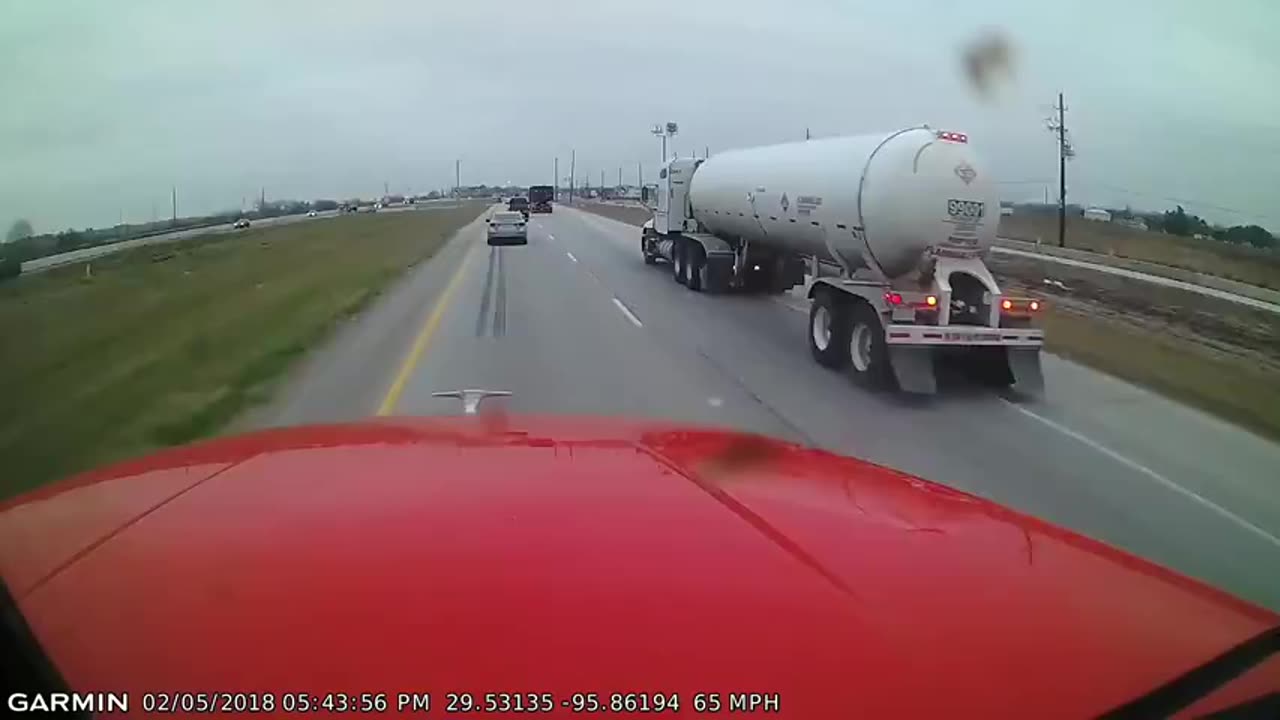 Distracted Driver Slams Highway Barrier - Causes Even Bigger Accident