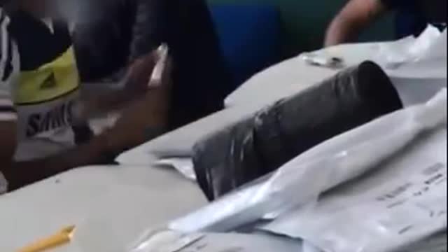 Surveillance Video: Britain's Covid Testing Facility Shows Tests being thrown out by the thousands