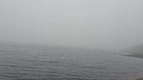 Mist Over A Lake In Great Britain