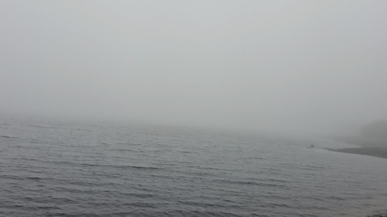 Mist Over A Lake In Great Britain