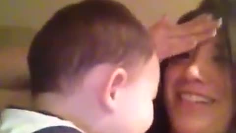Baby heat butting mom