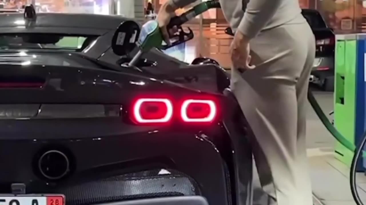 New rare clip of Andrew tate fueling his new car in style.
