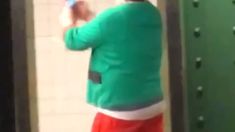 Man elf costume filming himself person sitting on floor