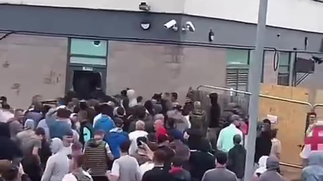 Protesters storm a hotel in Rotherham, UK,