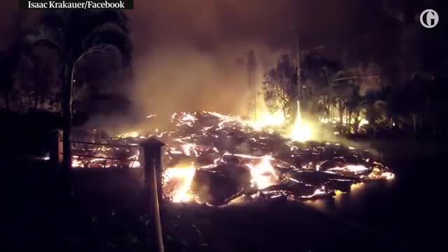 Lava from Kilauea volcano oozes down Hawaii street – timelapse video