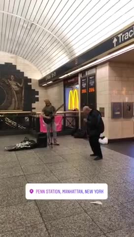 Penn station manhattan new york guitar music dance black jacket guy