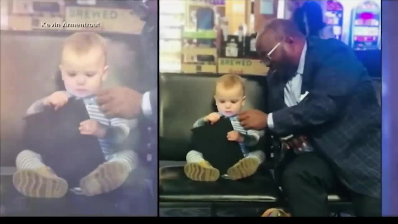 Photo of toddler and stranger bonding in airport goes viral