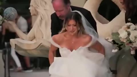 Paralyzed bride surprises groom by walking down the aisle