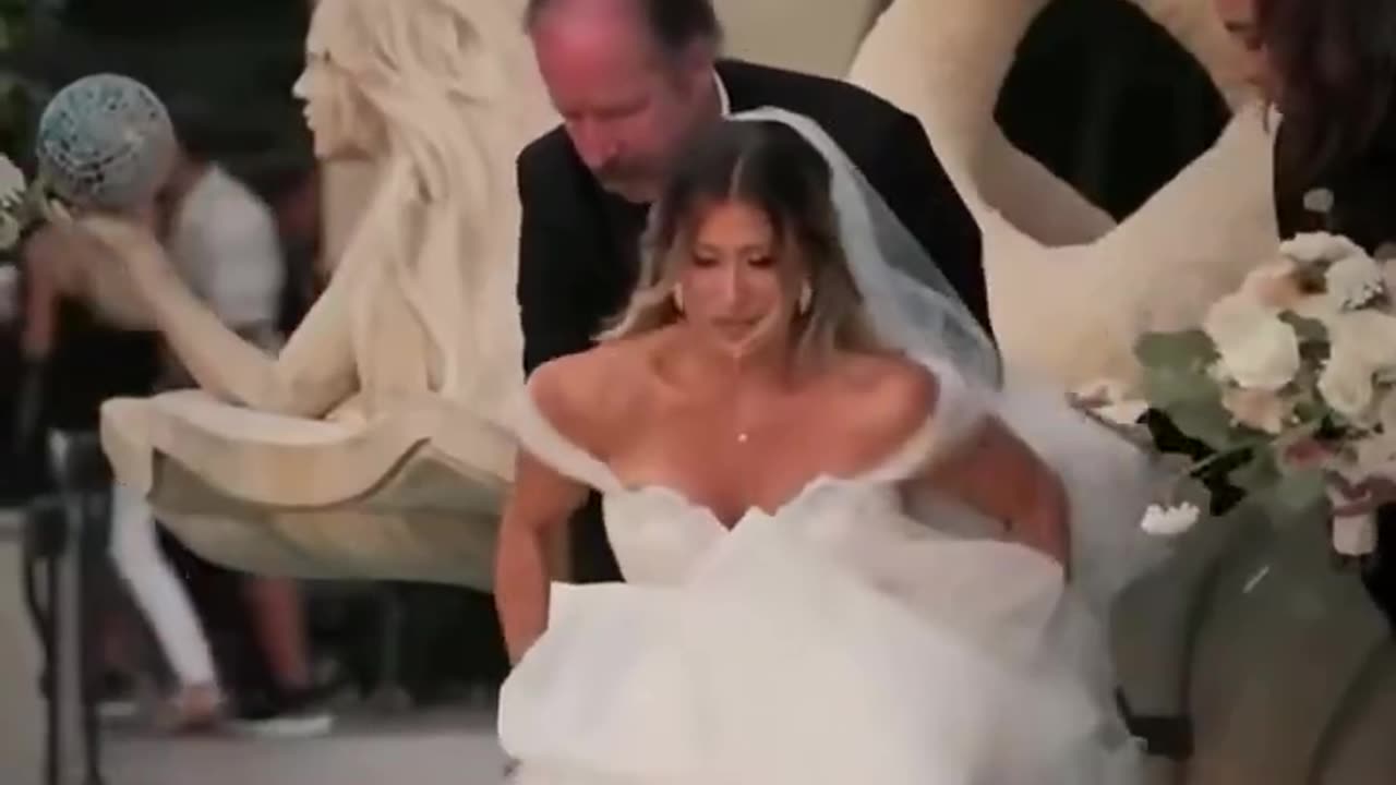 Paralyzed bride surprises groom by walking down the aisle