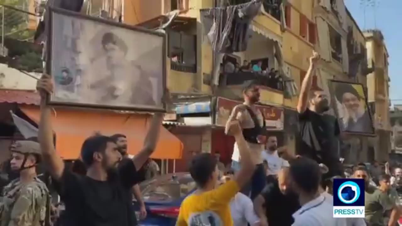 Lebanese protesters chant slogans while mourning the martyrdom of Hezbollah’s Secretary General