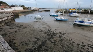 Boat at low tide. Sunny day.