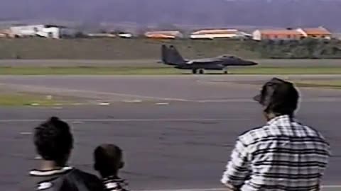 F-15 using the tail hook to catch the arresting cable.