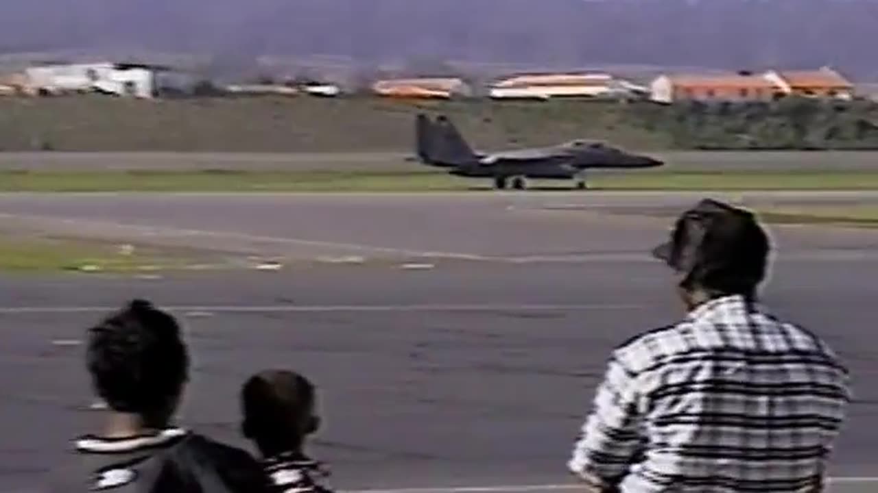 F-15 using the tail hook to catch the arresting cable.