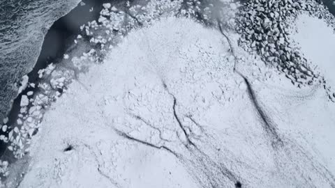 Waves breaking over ice