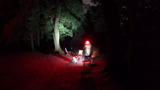 Camping chores at night . Night Lapse