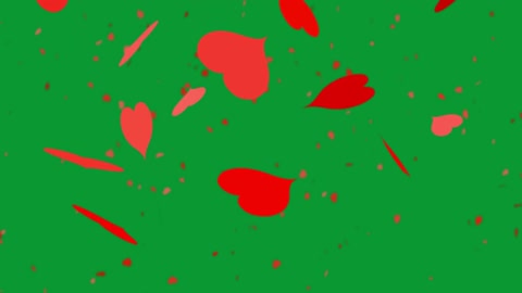 Red heart animation on green background.