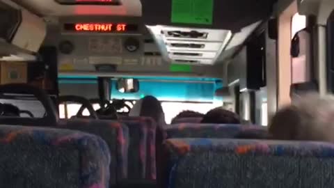 Man on bus rocks back and forth