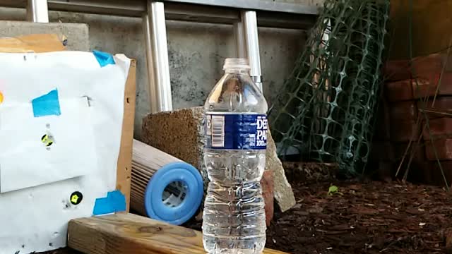 22 Caliber Pellet Through Water Bottle Slo Motion