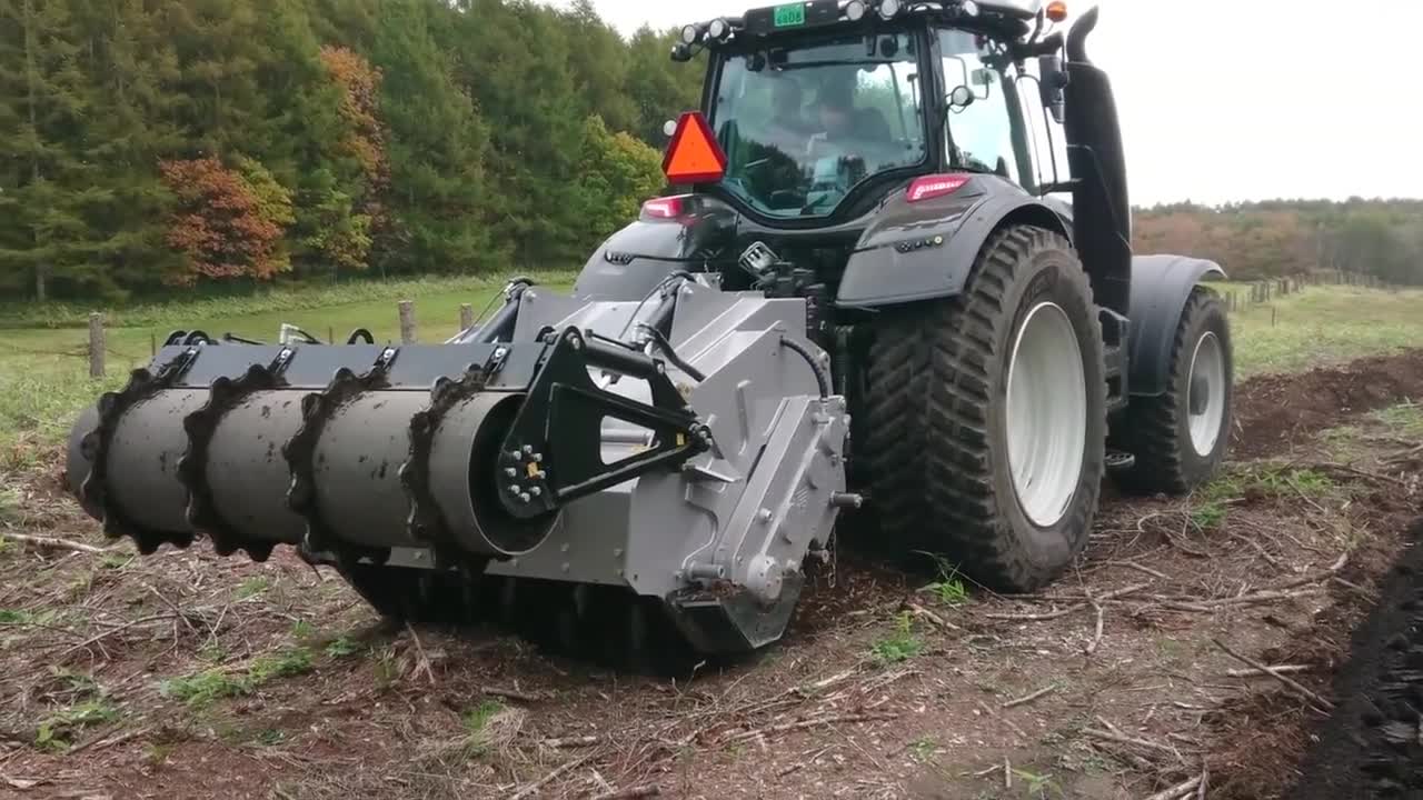 Big tractor preparing the soil