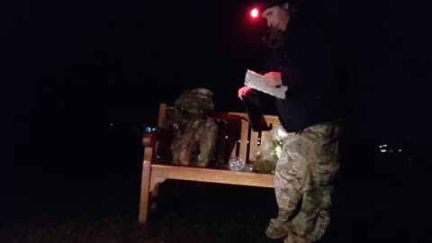 packing away the trekology chair at night by a river