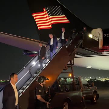 Trump arrives in New Jersey, hours after surviving assassination attempt.
