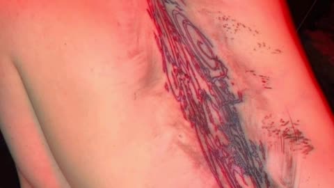 Billie Eilish gets a huge back tattoo