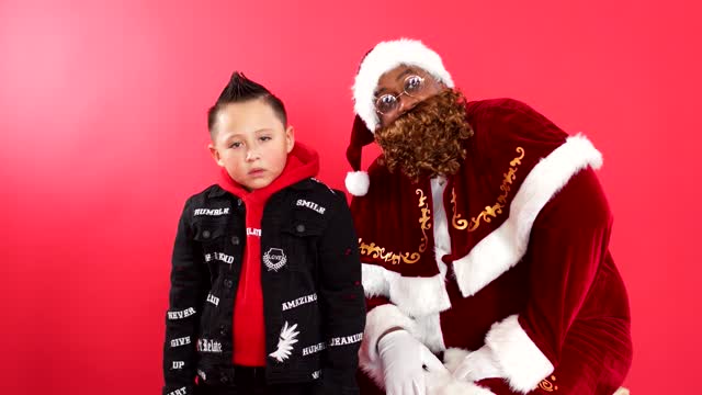 Little Boy Posing with Santa