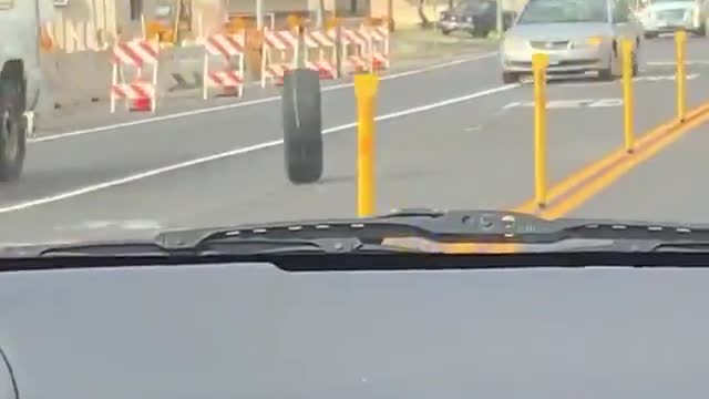 Loose Wheel Ricochets Through Traffic