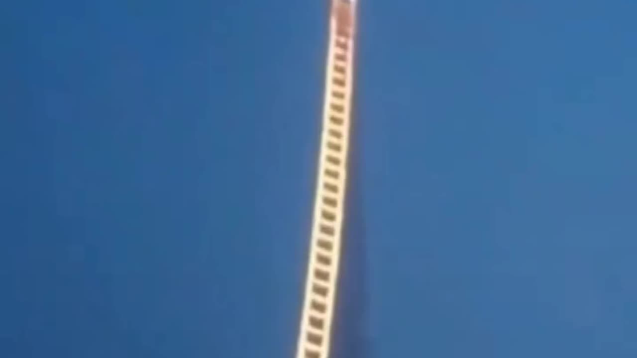 CHINESE ARTIST BUILT STAIRS TO HEAVEN WITH FIREWORKS AS A TRIBUTE TO HIS GRANDMOTHER