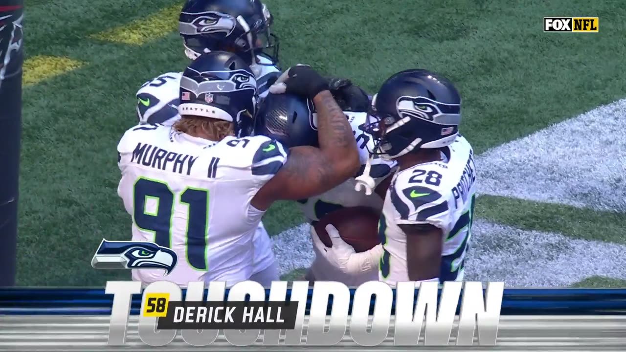 NFL - SEAHAWKS STRIP SACK AND TOUCHDOWN.