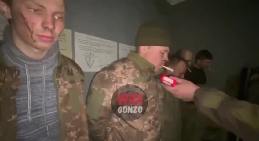 Russians towards captured Ukrainian soldiers