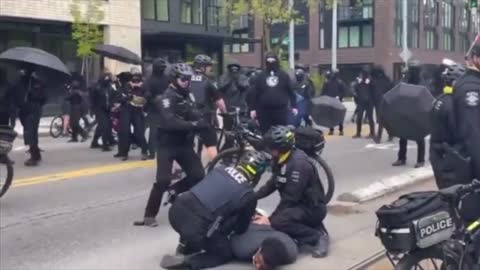 BLM Antifa in Seattle: Police rushed in to arrest BLM-Antifa rioters after they assaulted a child.